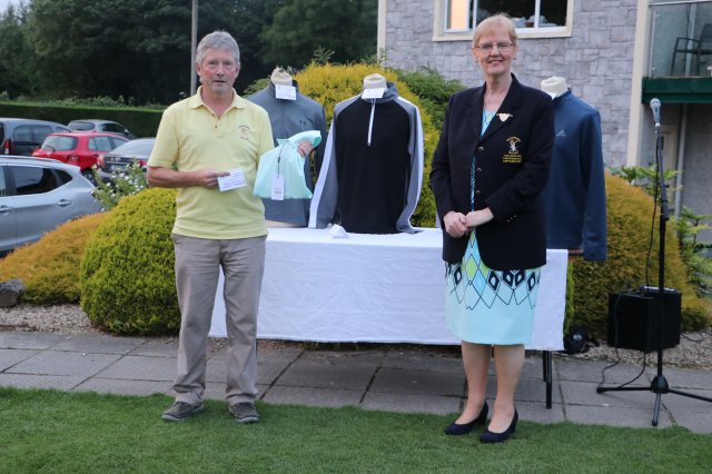 image lady-president-stephanie-gorman-presenting-michael-dunne-with-3rd-in-the-mens-18-hole-at-the-lady-presidents-prize-day-in-portarlington-golf-club-jpg